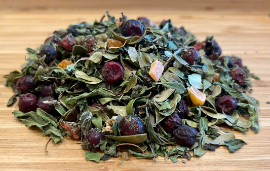 lady's mantle leaves, lemon balm, peppermint, sour cherry berries, hawthorn, candied lemon peel, candied pineapple, cranberries, and strawberries